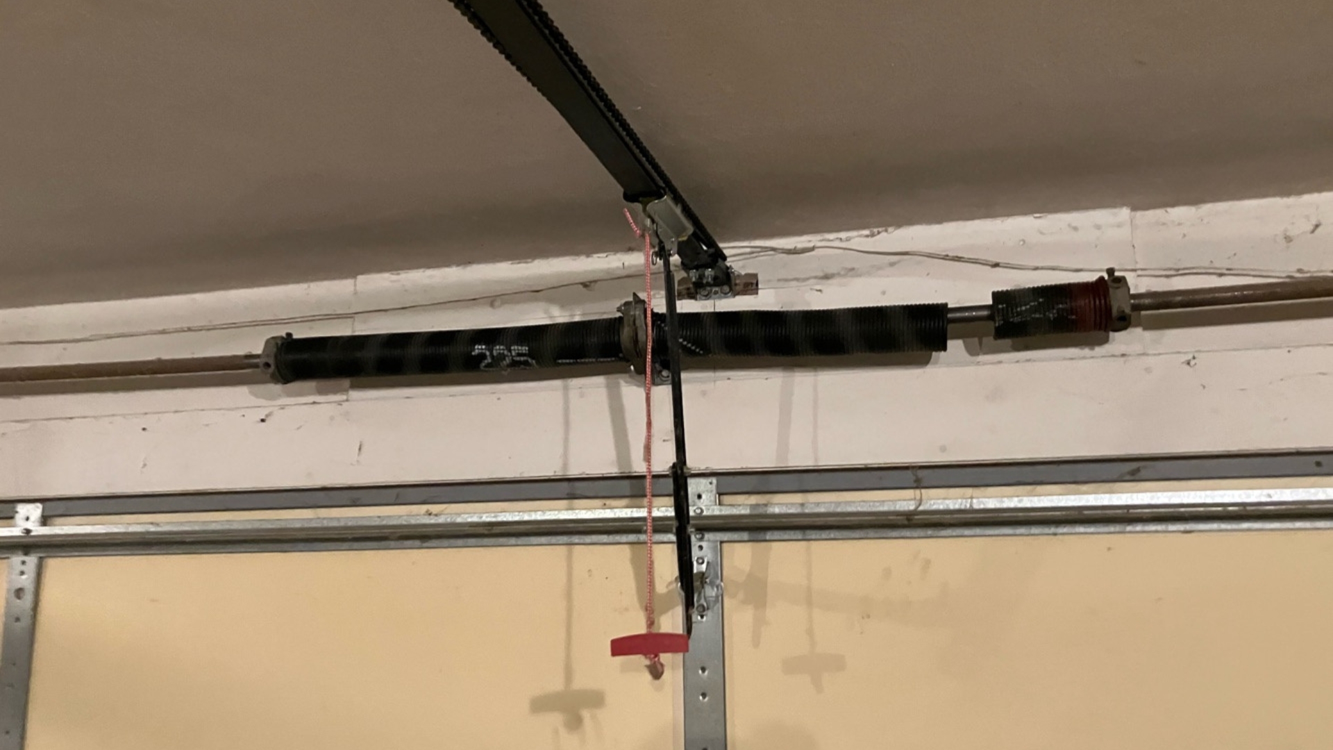 Broken spring system needing expert garage door repair