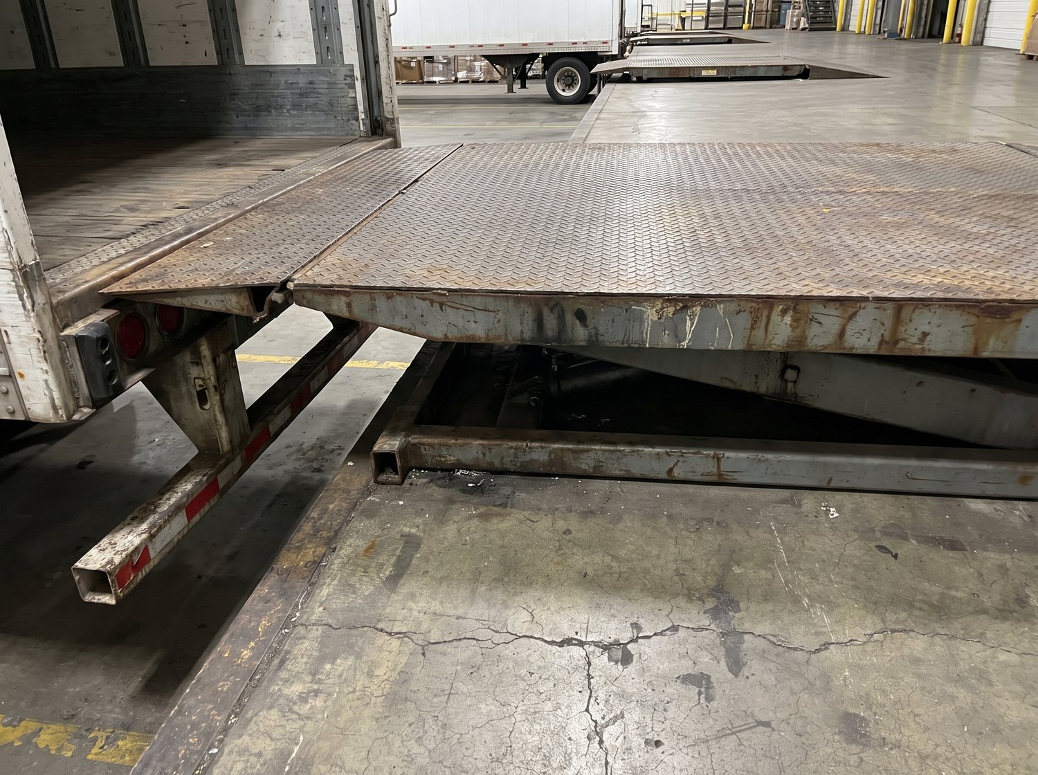 Hydraulic dock leveler repaired at a Houston warehouse loading bay